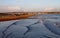 Sun setting on Dawlish Warren with Exmouth in the background