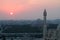 The Sun Setting over Manama City with the Minaret of Al Fateh Grand Mosque in Foreground