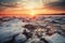 the sun is setting over the water and rocks covered in ice and snow on the shore of a lake or river with a few ice chunks in the