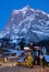 The sun setting over the Wetterhorn mountain behind the Alpine village of Grindelwald, Switzerland.