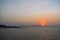 Sun setting in the shore of mumbai just beside the ocean