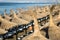 Sun shades above loungers on beach