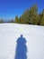 Sun shadow of hiker on the frish spring alpine snow, Einsiedeln - Canton of Schwyz, Switzerland Schweiz