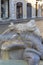 Sun-shaped human face on Fountain of the Boat Fontana della Barcaccia, next to 18th century Spanish Steps in Piazza di Spagna