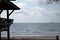 Sun shelter over looking beach with an island in the background  Thailand