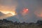 Sun shines through the smoke of the a California Wildfire in the Alabama Hills