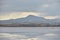 Sun shining mountain landscape at Larnaca Salt Lake Cyprus