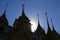 Sun Shining Through the Silhouette of Loha Prasat Spires, Wat Ratchanatdaram Temple, Bangkok Old City, Thailand