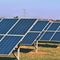 Sun and solar panels in a field. Solar energy power plant. Industrial and ecological concept for nature and eco / green technology