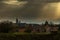 The sun trying to shine through the dramatic and dark sky during autumn in Maastricht