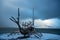 Sun voyager metal viking ship statue in Reykjaik Iceland with dramatic sky