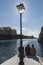 Sun Worship and lamp post on the jetty in Xlendi