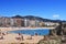 Sunbathers at Platja de Lloret beach in Lloret de Mar, Spain