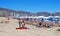 Sunbathers at San Antonio Beach in Cullera, Spain