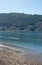 Sunbathers on a sandy beach