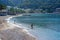 Sunbathers on a sandy beach