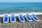 Sunbathing blue beds on the beach