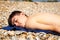 Sunbathing on a stoney beach