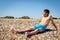 Sunbathing on a stoney beach