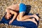 Sunbathing on a stoney beach