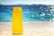 Sunbathing - suntan cream or oil on beach