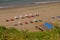 Sunbathing Umbrella next to a Cafe on Vagator Beach in Goa, India