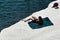 Sunbathing on the white rocks of Governos Beach in Cyprus