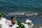 Sunbathing on the white rocks of Governos Beach in Cyprus