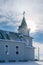 Sunbeam over the steeple of the historic Peace Lutheran Church