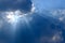 Sunbeam, sunlight through the haze, cloud on the blue sky . Cloud with sun ray