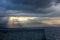 Sunbeams through clouds, Mediterranean sea, Heraklion, Greece