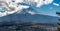 Sunbeams or Crepuscular rays trhough clouds over mount fuji from Arakurayama Sengen park.