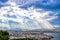 Sunbeams shining through the dramatic clouds over the city Chania