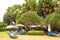 Sunbeds and deck chairs under the trees thailand tropical tropics