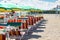 Sunbeds and umbrellas on the beach in Bellaria Igea Marina, Rimini, Italy