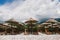 Sunbeds and umbrellas on a deserted beach in Budva, Montenegro.