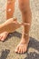 Sunblock Lotion on Child Legs