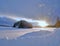 Sunburst over a frozen lake near Kemijarvi Finland