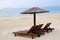 Sunchairs and umbrellas on the beach