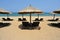 Sunchairs and umbrellas on the beach