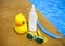 Suncream, snorkel, goggles and yellow rubber duck