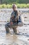 SUNDARBANS, BANGLADESH - NOVEMBER 14, 2016: Tourist in a muddy river coast during a Sundarbans tour, Banglades