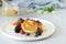 Sunday breakfast with cheesecake, honey, fresh berries and mint. Cottage cheese pancakes