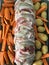 Sunday home made lunch: the making of a oven baked meatloaf covered in bacon, with potatoes and sweet potato on the side