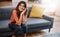 Sundays are sofa days. an attractive young woman relaxing on the sofa at home.