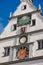 Sundial astronomical clock at tavern building facade Rothenburg ob der Tauber Old Town Bavaria Germany