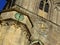 Sundial and clock on church tower