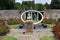 Sundial and The statue of John Flamsteed at Herstmonceux Castle in England