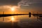 Sundown reflections of a fisherman tractor at low tide on Taiwan west coast