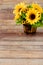 Sunflower Bouquet in Wooden Flowerpot on Wood Background